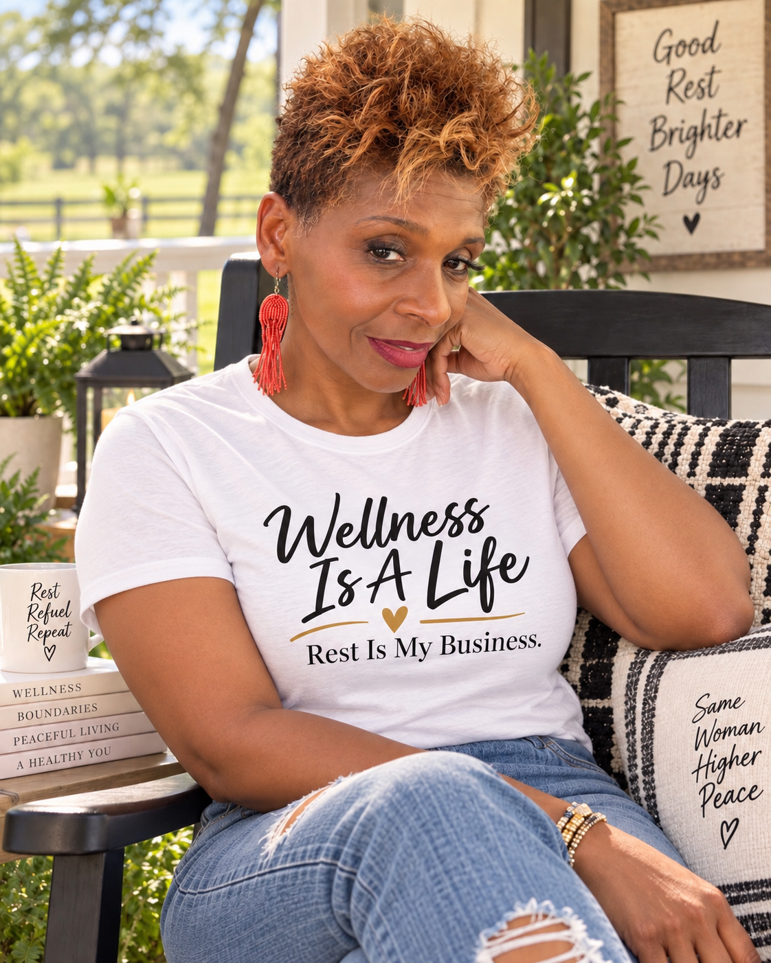 Lady J wearing a WellNest wellness T-shirt